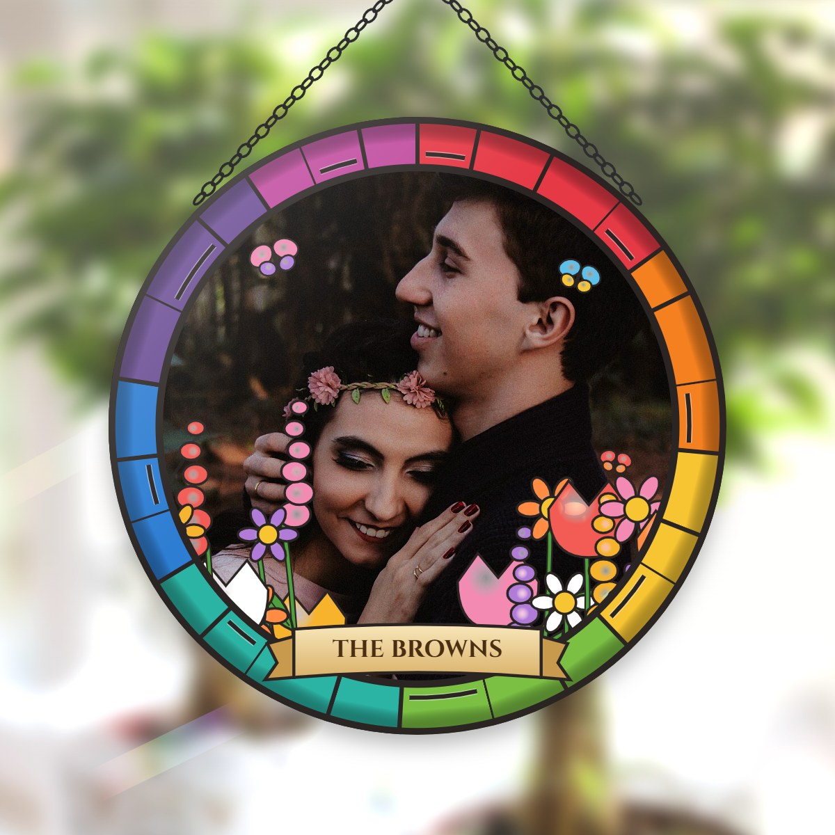 Personalized stained glass family photo suncatcher hanging in a sunny window
